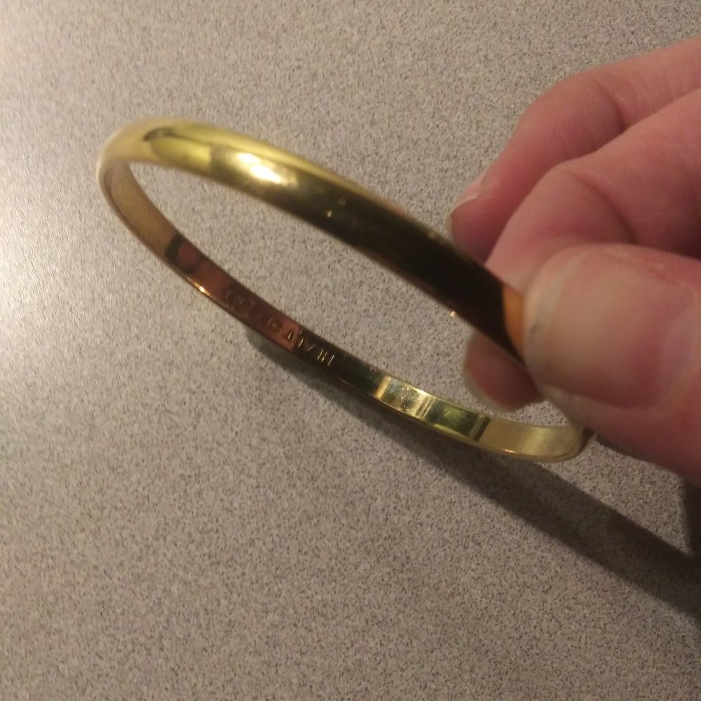 Kate Spade gold bangle bracelet